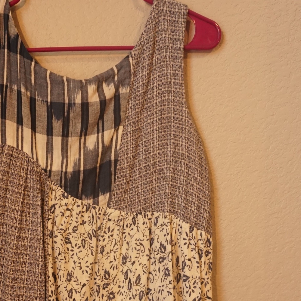 Anthropologie mini dress. Blue print with detail. Size small.